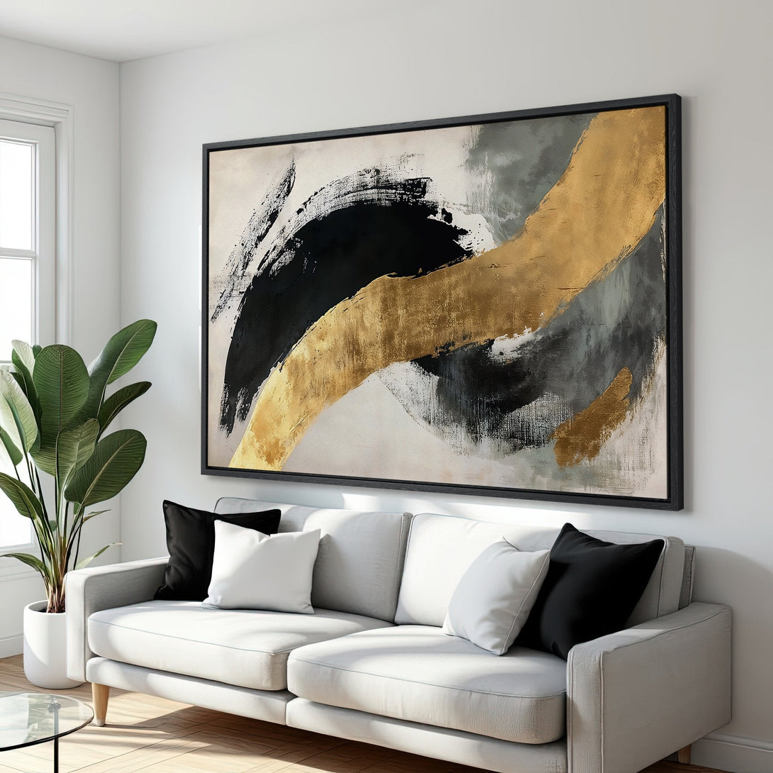 Framed Wall Art: Abstract canvas print in black, gold, and gray. Modern art piece adds a touch of luxury to any living room. Shop now!