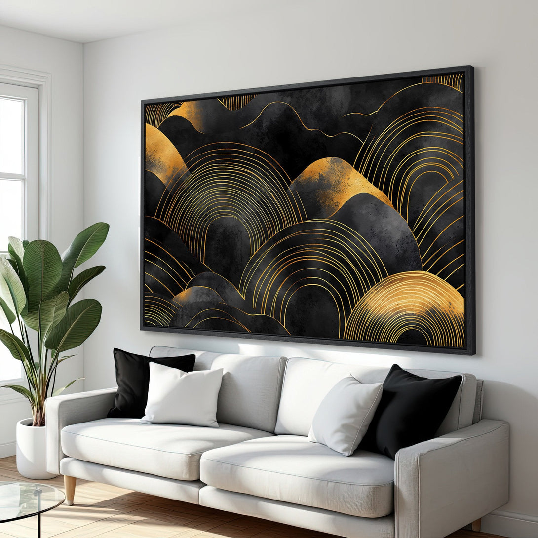 Framed Wall Art: Abstract black and gold canvas print. Modern art with geometric shapes, perfect for living room decor. Stylish wall art in a contemporary interior.