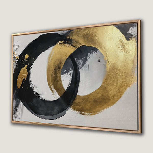 Framed Wall Art: Abstract gold and black brushstroke design on canvas. Modern art piece with neutral, luxurious color palette. Elevate your space!