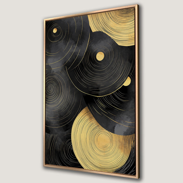 Framed Wall Art featuring an abstract design of gold and black concentric circles. Modern art piece perfect for any interior decor.