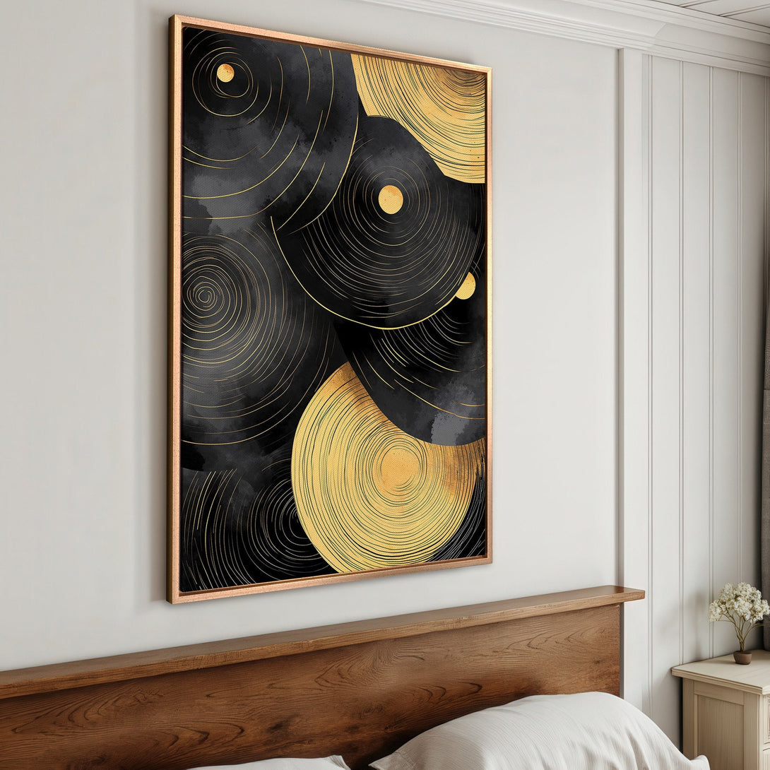 Framed Wall Art: Abstract black and gold circles canvas print. Modern art with a luxurious gold and black color palette for stylish home decor.
