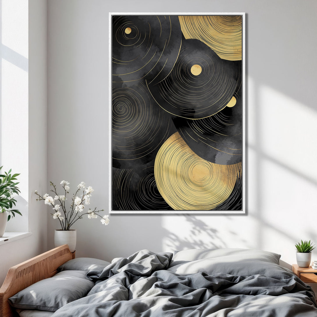 Framed Wall Art featuring a modern abstract design in black and gold. Perfect for bedroom decor, this canvas print adds a touch of elegance.