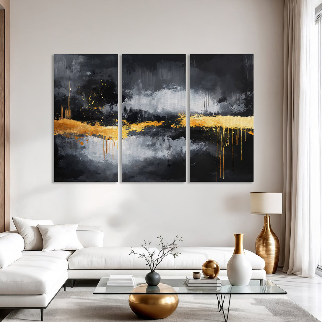 Abstract Canvas Print triptych in black, gray, and gold. Modern art for your home, adding a touch of elegance.