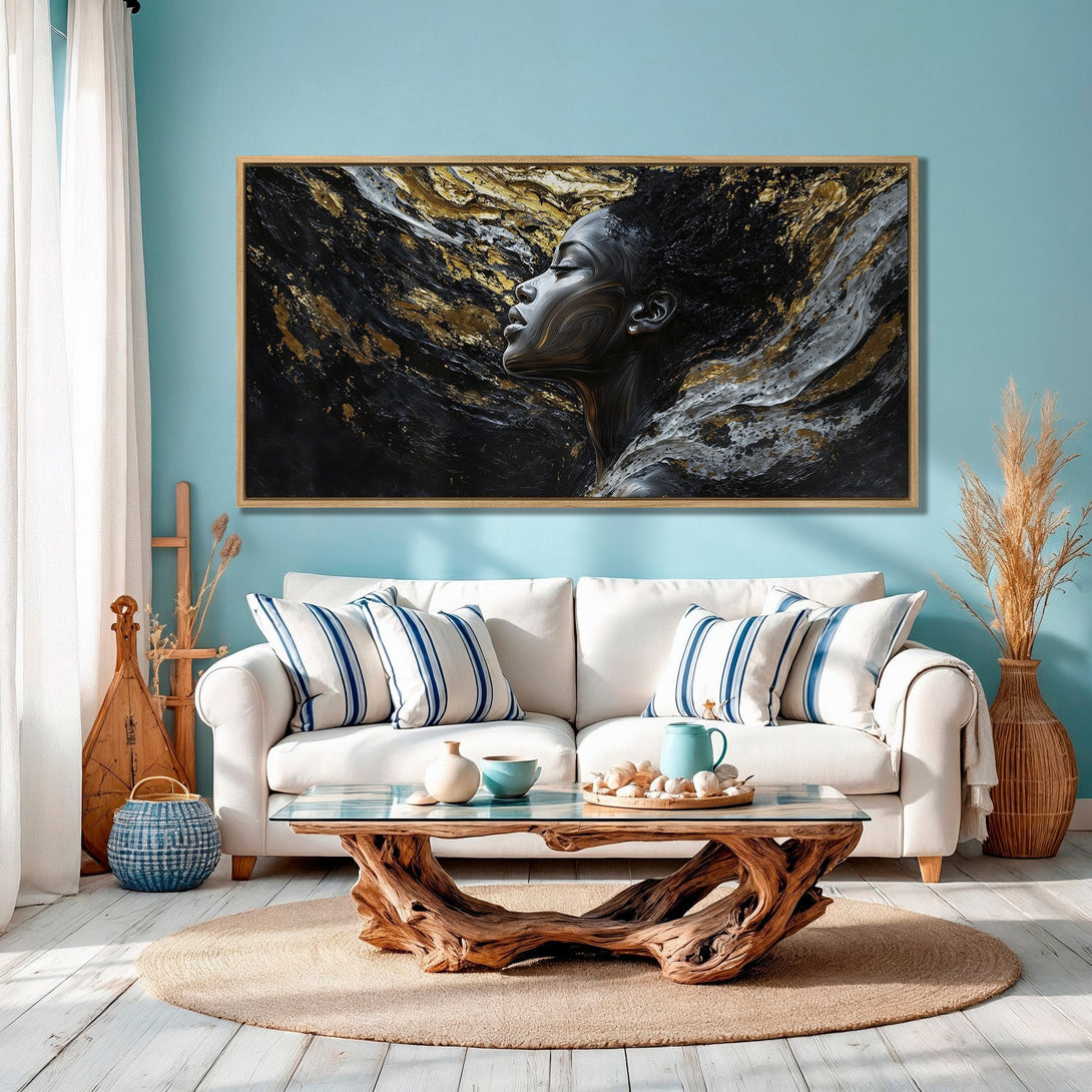 Framed Wall Art featuring an abstract woman's face in black, gold, and white. Modern art canvas print adds elegance to any interior.