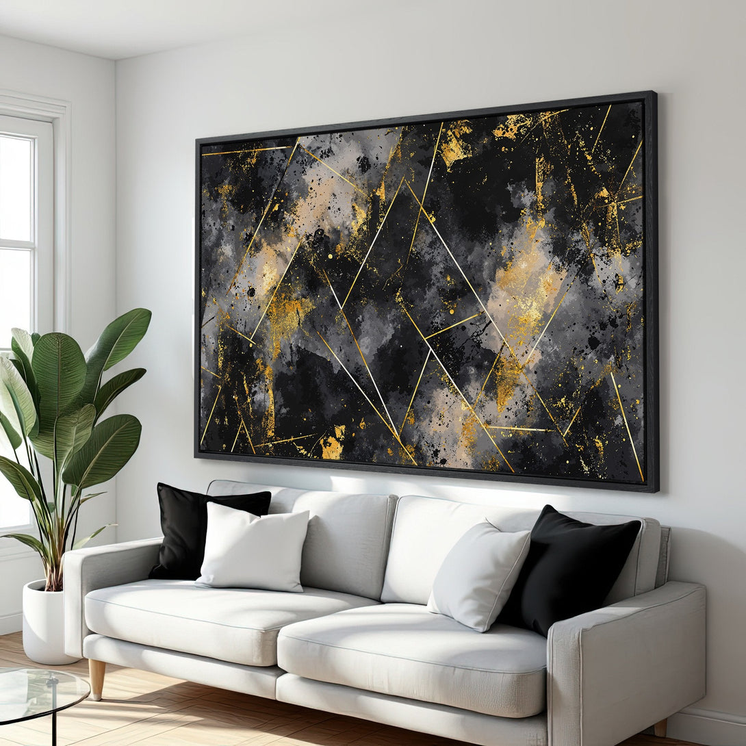 Framed Wall Art: Abstract black, gold, and gray canvas print. Modern geometric design with a luxurious color palette, perfect for stylish home decor.