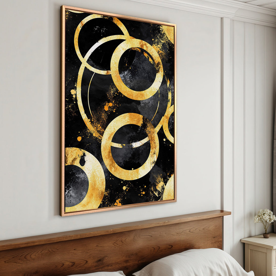 Framed Wall Art featuring abstract gold circles on black canvas. Modern art with a luxurious, elegant color palette. Perfect for bedroom decor.