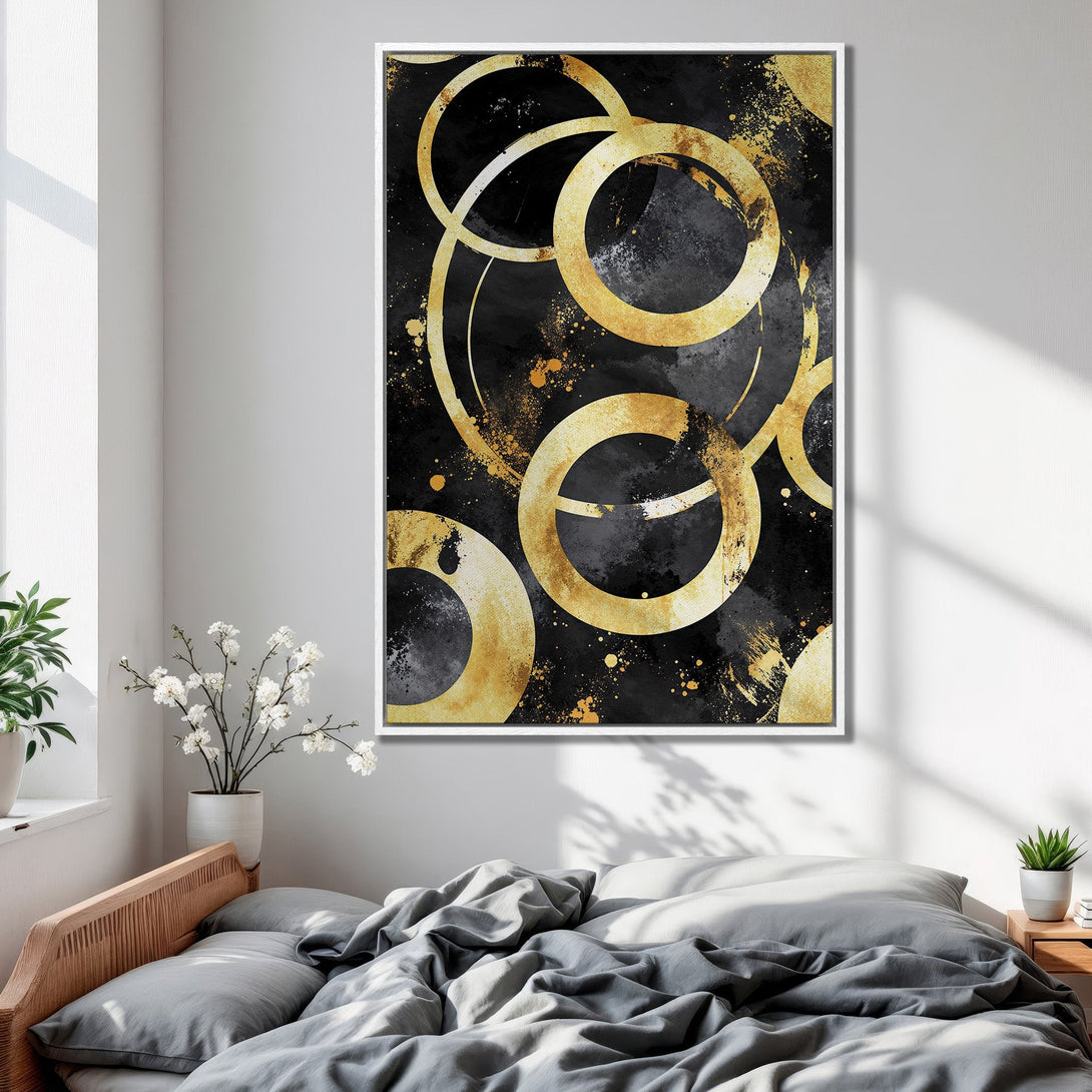 Framed Wall Art featuring abstract gold circles on a black and gray background. Modern art for bedroom decor.