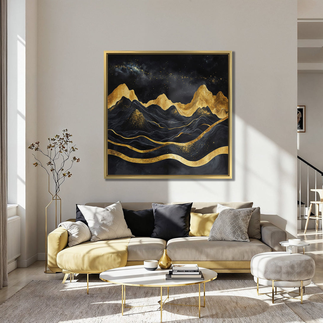 Canvas Print of abstract gold mountain landscape art in a modern interior with red chairs. Black, gold, and teal color palette.