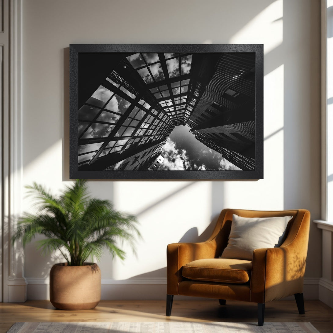 Framed Poster of architectural cityscape in black and white. Modern art print for home decor, featuring a dramatic sky view.