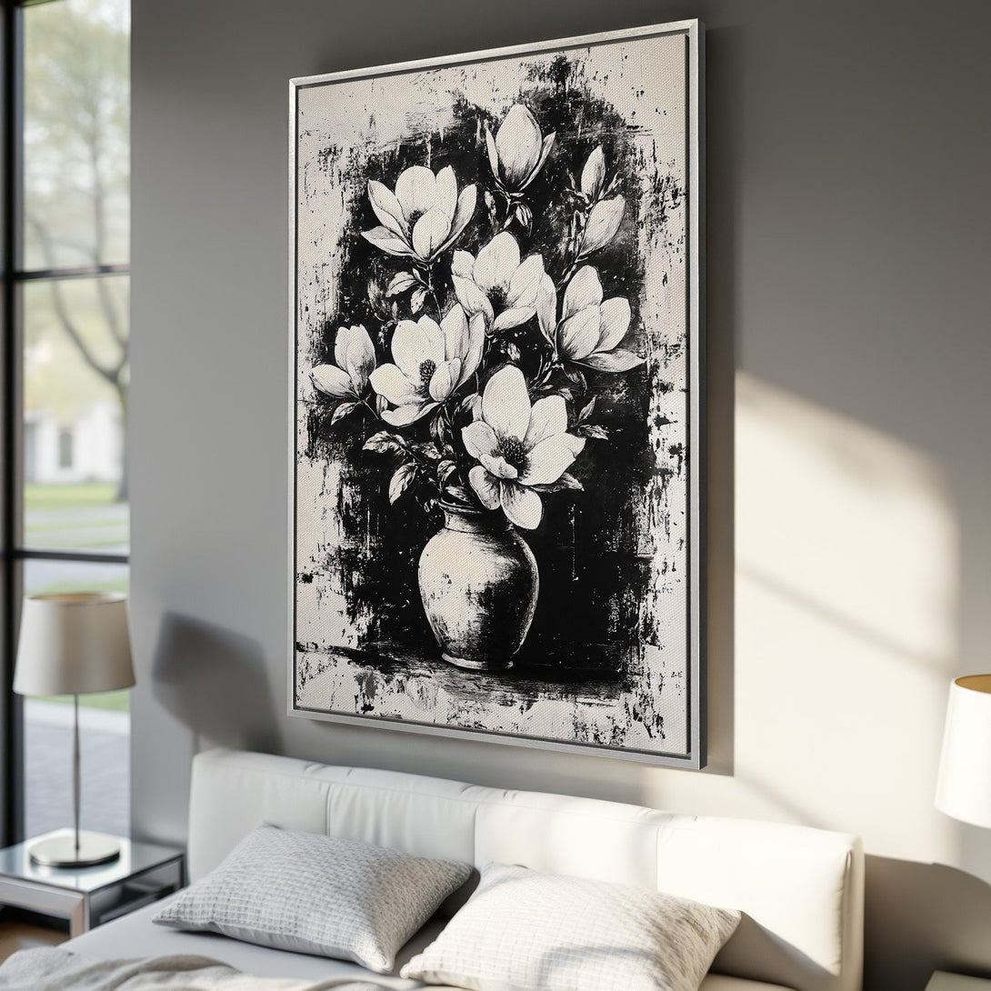 Framed Wall Art: Black and white floral canvas print, perfect for modern decor. Abstract style with a monochrome color palette, featuring a vase of flowers.