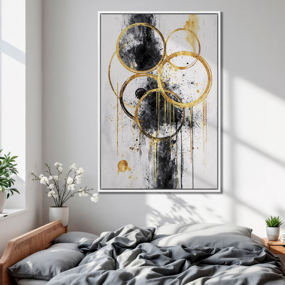 Framed Wall Art featuring abstract gold circle design on a white and black background. Modern art for bedroom decor, adds a touch of elegance.