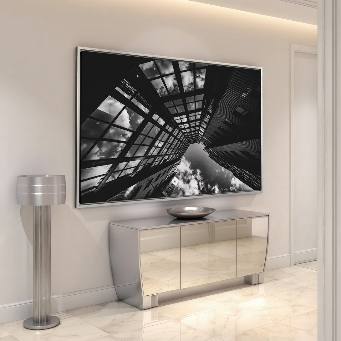 Framed Wall Art: Dramatic black and white cityscape canvas print. Modern art featuring architectural details, perfect for contemporary home decor.