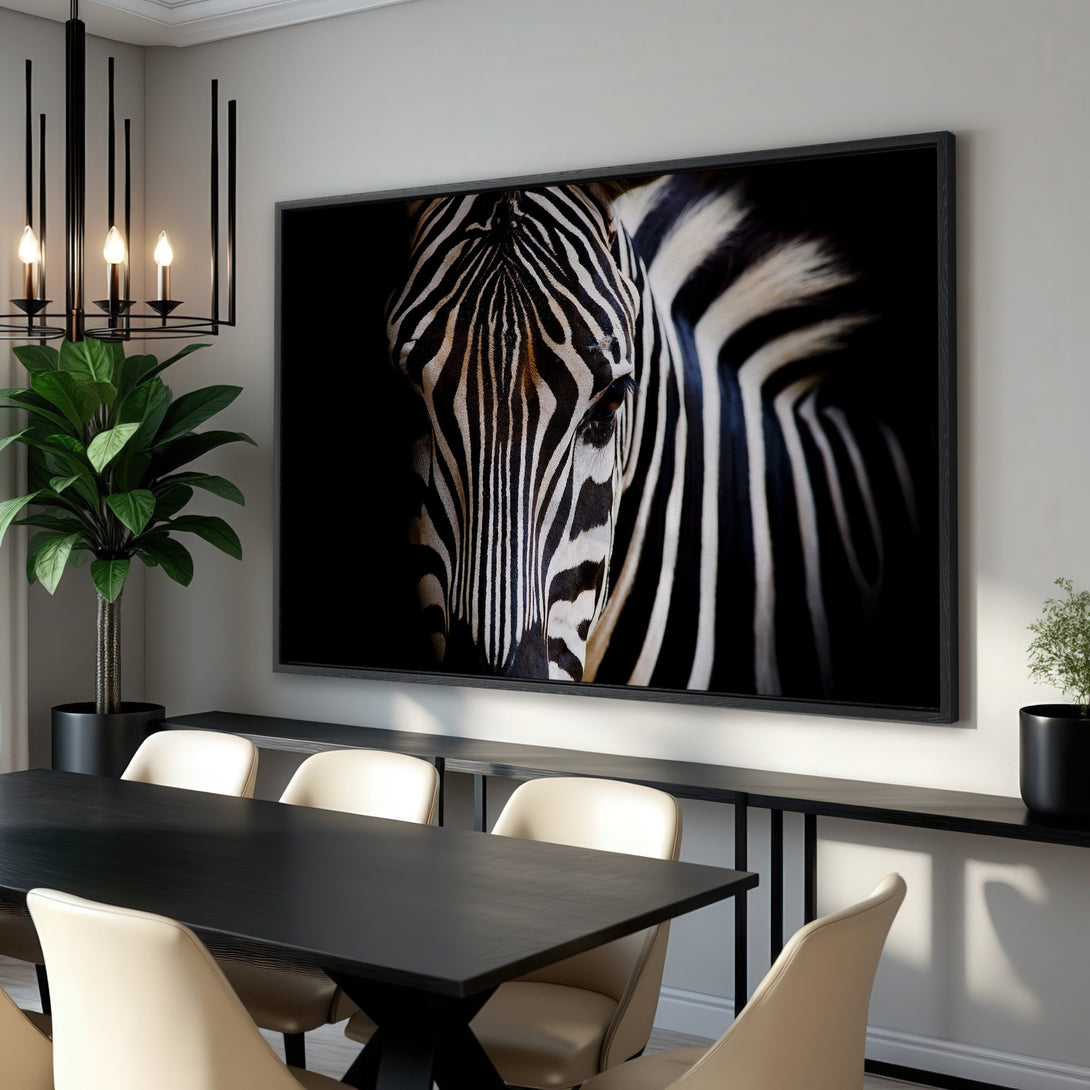 Framed Wall Art: Striking zebra portrait in monochrome. Modern decor with a bold black, white, and tan color palette. Elevate your space with this canvas print.