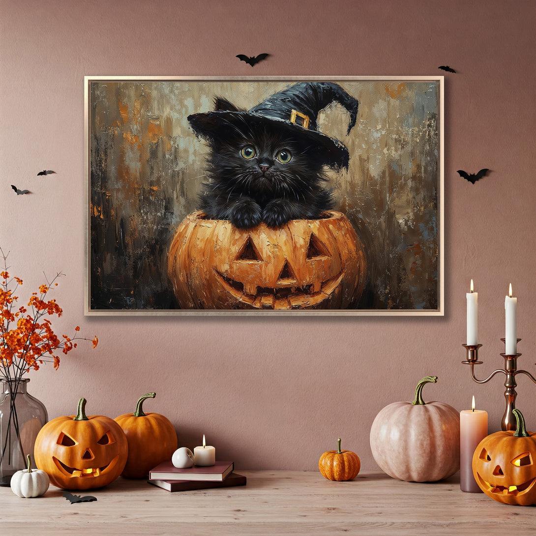Framed Wall Art: Adorable black cat in a witch hat inside a pumpkin. Halloween decor with warm orange, brown, and black color palette. Perfect for spooky season!