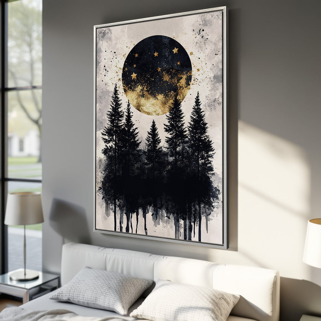Framed Wall Art featuring a black forest silhouette under a gold and black moon. Modern, abstract style with a neutral color palette. Perfect for bedroom decor!