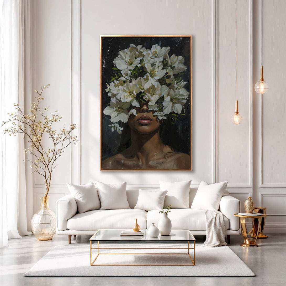 Framed Wall Art featuring a woman with flowers, displayed in a modern interior. Neutral color palette with gold accents. Elevate your space with this stunning artwork.