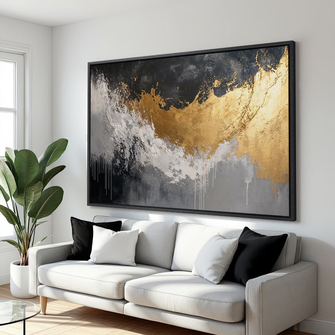 Framed Wall Art: Abstract gold, black, and white canvas print. Modern art piece in a minimalist interior, perfect for living room decor.