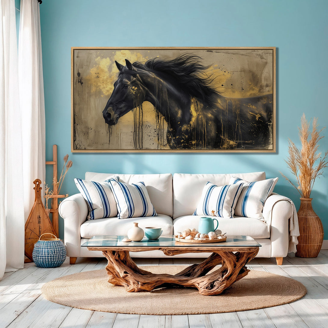 Framed Wall Art: Black horse painting with gold accents. Modern art in a living room with a blue and gold color palette.