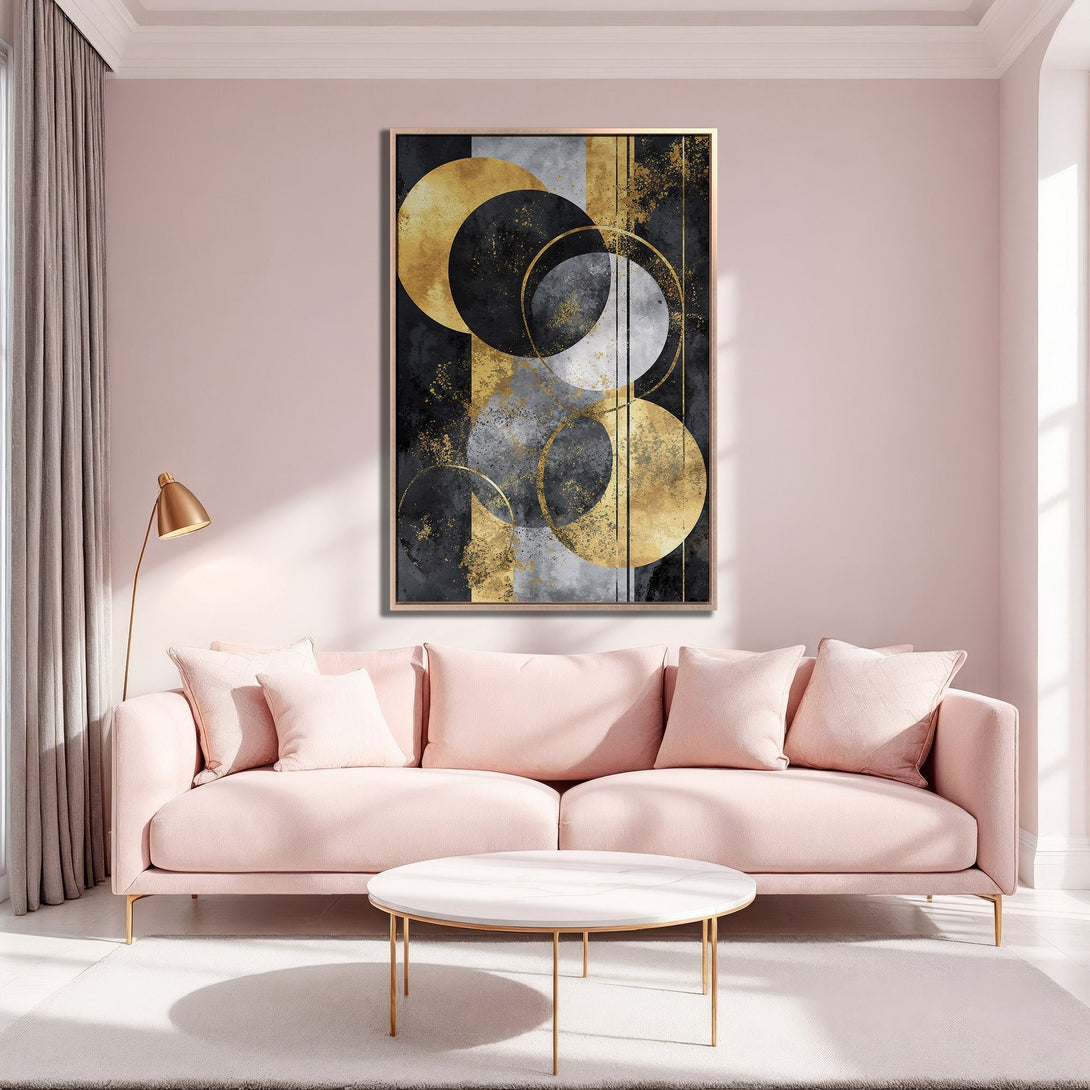 Framed Wall Art featuring abstract gold and black geometric design. Modern art canvas print in a blush pink interior, perfect for adding elegance.