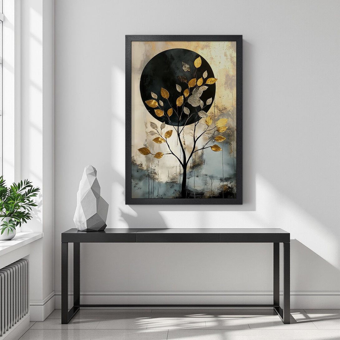 Framed Poster featuring a tree with gold leaves against a black circle. Modern abstract style with a neutral and gold color palette.