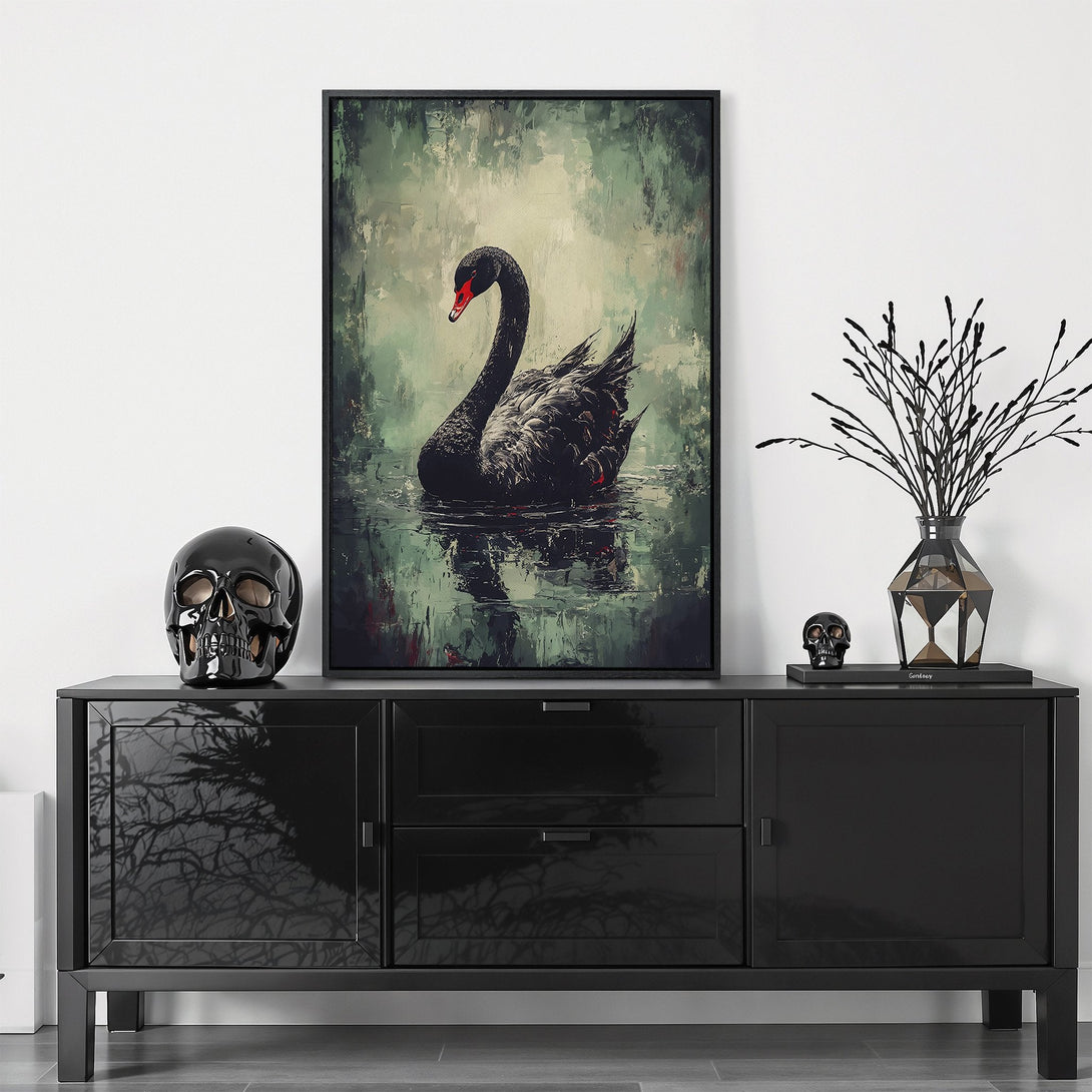 Framed Wall Art featuring a black swan painting with a dark, moody green and black color palette. Perfect for adding a touch of elegance to your space.