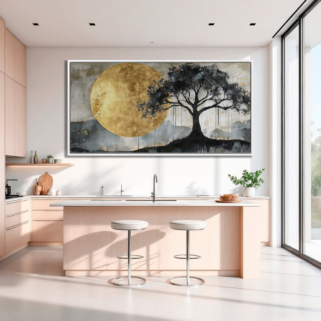 Framed Wall Art featuring a gold moon and tree in a modern kitchen. Abstract style with a neutral, gold, and black color palette. Elevate your space!