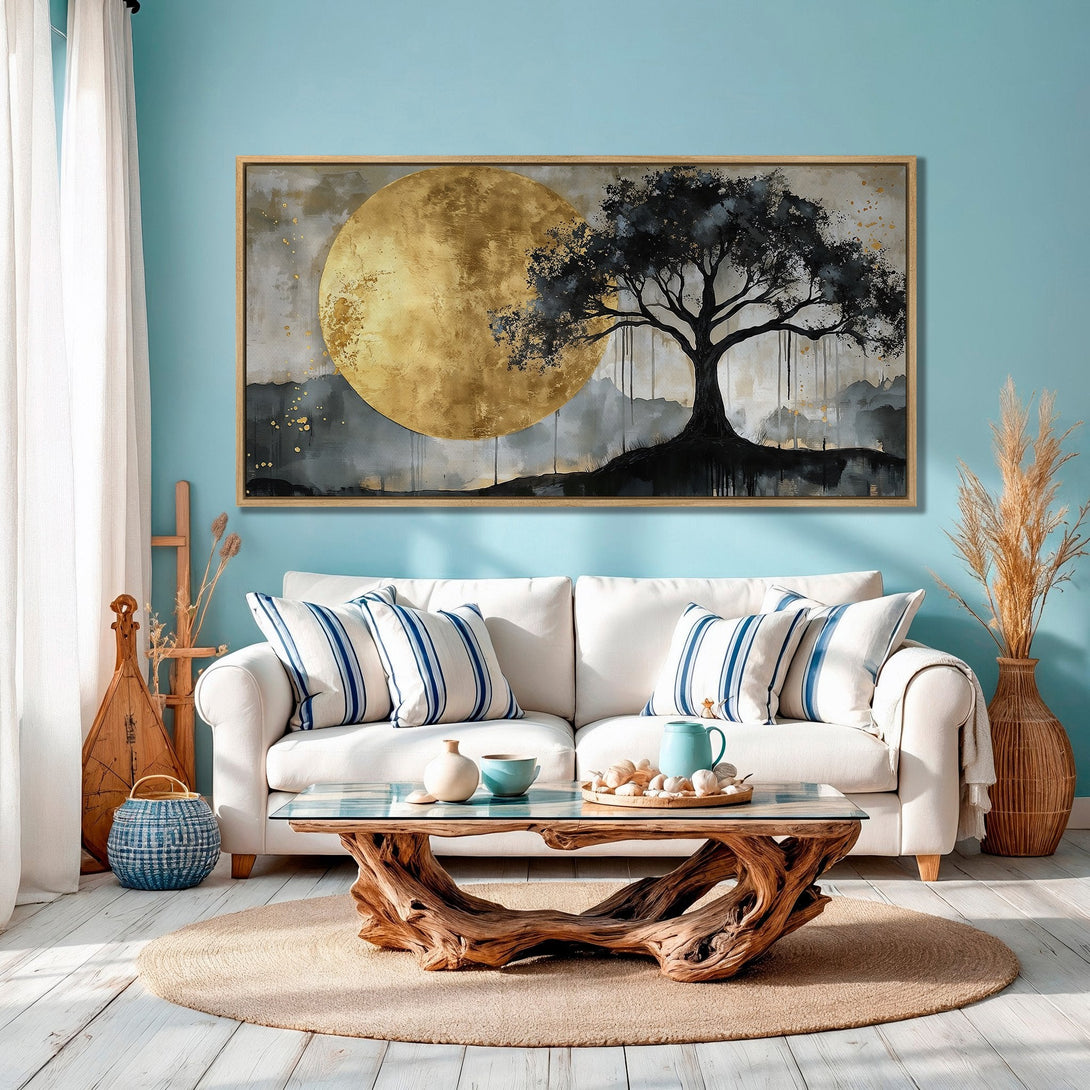 Framed Wall Art: Abstract tree art with gold accent. Modern decor in a living room with a calming blue, gold, and gray color palette.