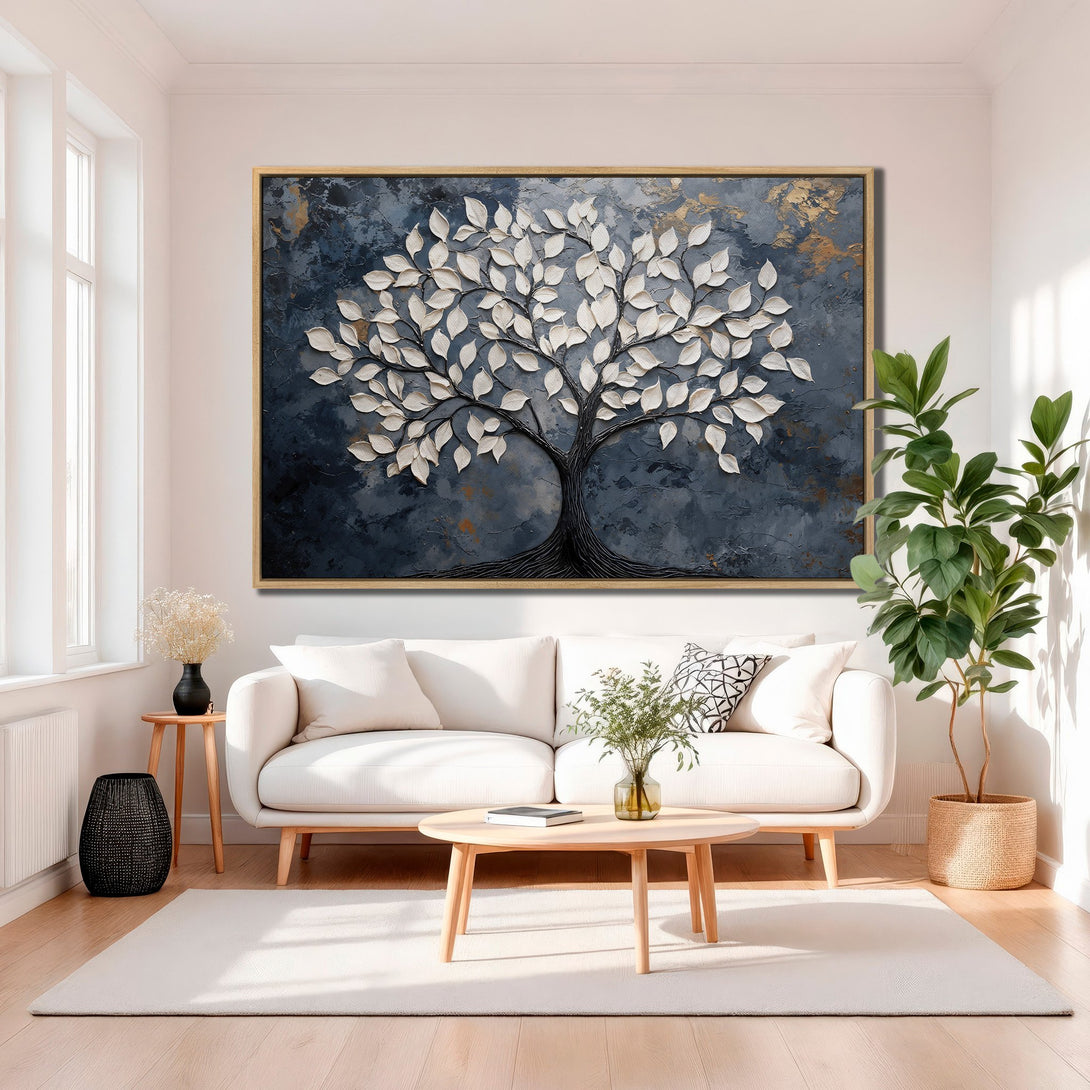 Framed Wall Art: Abstract tree art in a modern living room. Textured canvas print with a blue, white, and gold color palette. Elevate your home decor!