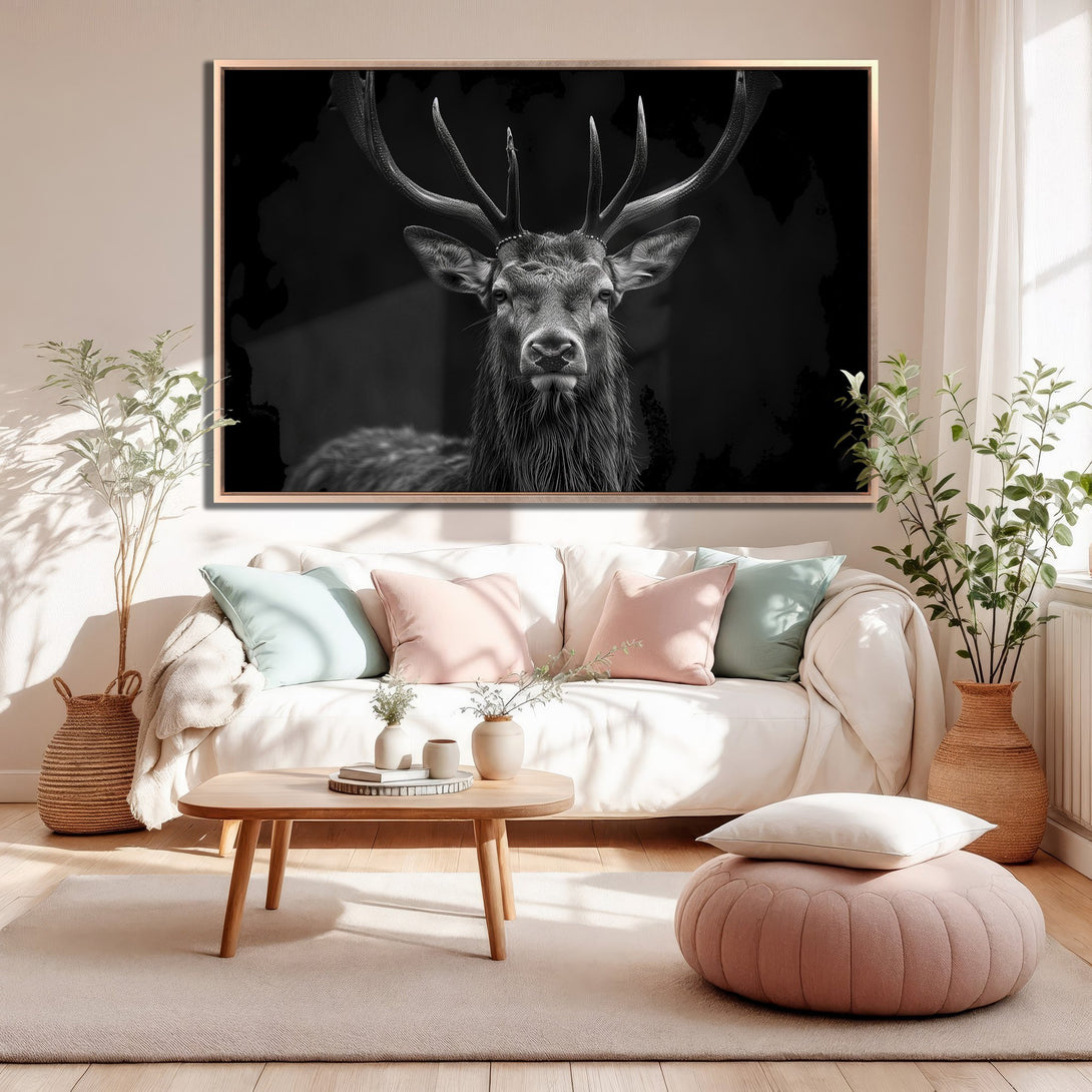 Framed Wall Art: Majestic black and white stag portrait. Modern Canvas Print adds a touch of elegance to any room. Neutral palette with pops of pink and blue.
