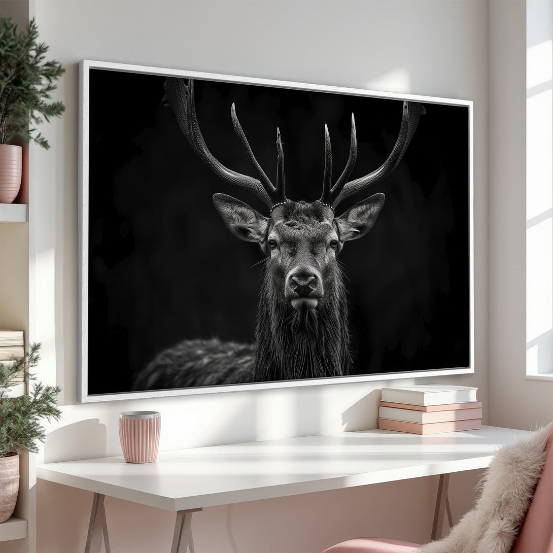 Framed Wall Art: Majestic black and white stag portrait. Elegant, minimalist design. Perfect for modern home decor. Shop stunning wall art today!