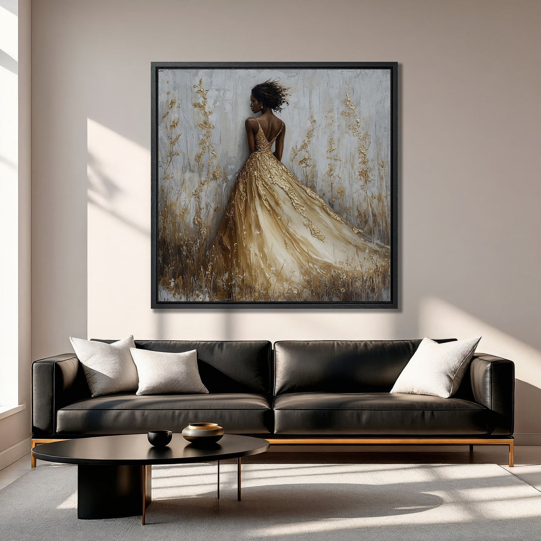 Framed Wall Art: Elegant woman in gold dress. Abstract art style with gold and neutral tones. Perfect for living room decor.