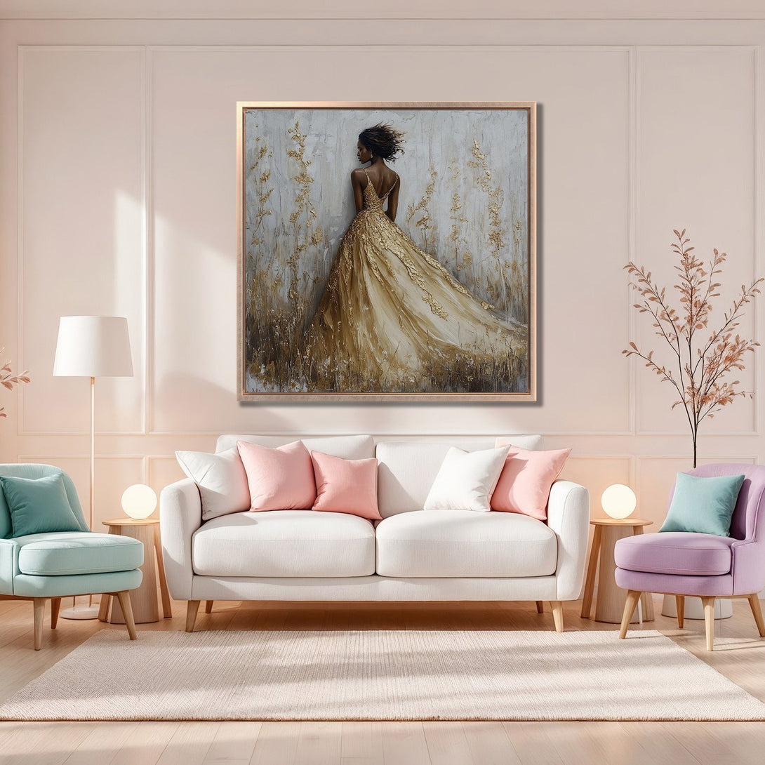 Framed Wall Art featuring a woman in a gold dress, displayed in a stylish interior. Elegant artwork with a neutral and gold color palette. Shop now!