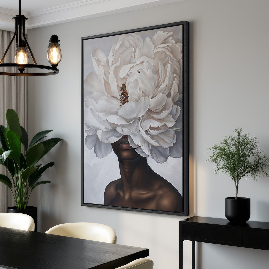 Framed Wall Art featuring a woman with a flower head. Modern, elegant style with a neutral color palette of white, gray, and black. Perfect for home decor.