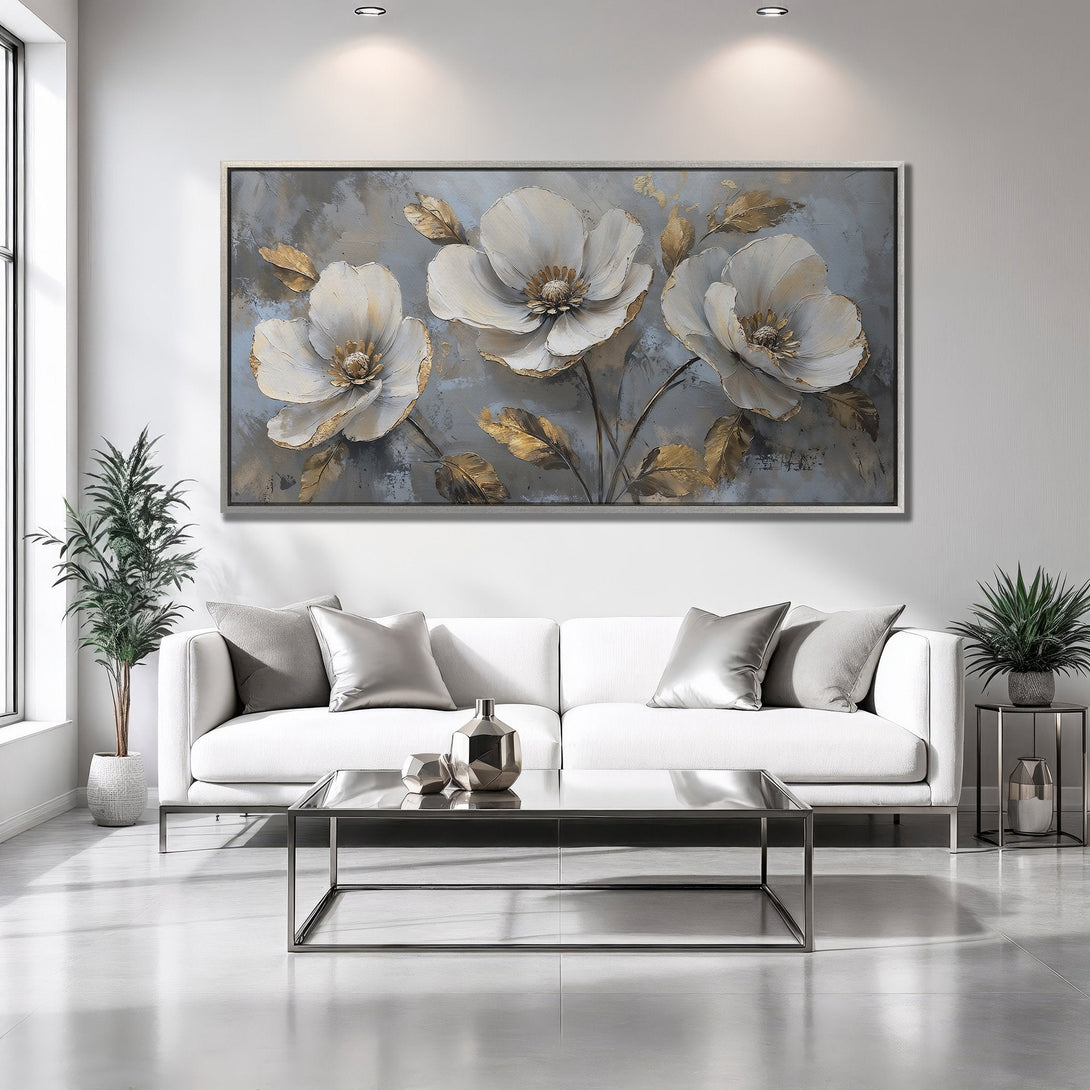 Framed Wall Art featuring elegant white floral design with gold accents. Modern decor in a neutral gray and gold color palette. Perfect for your living room!