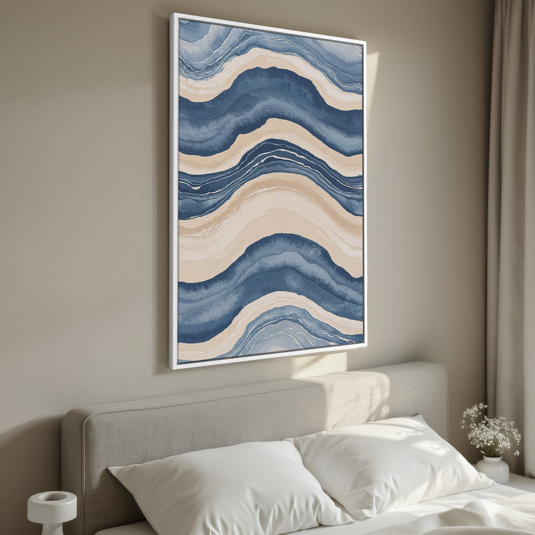 Framed Wall Art featuring an abstract watercolor design in blue and beige tones. Perfect for adding a touch of modern art to your bedroom decor.