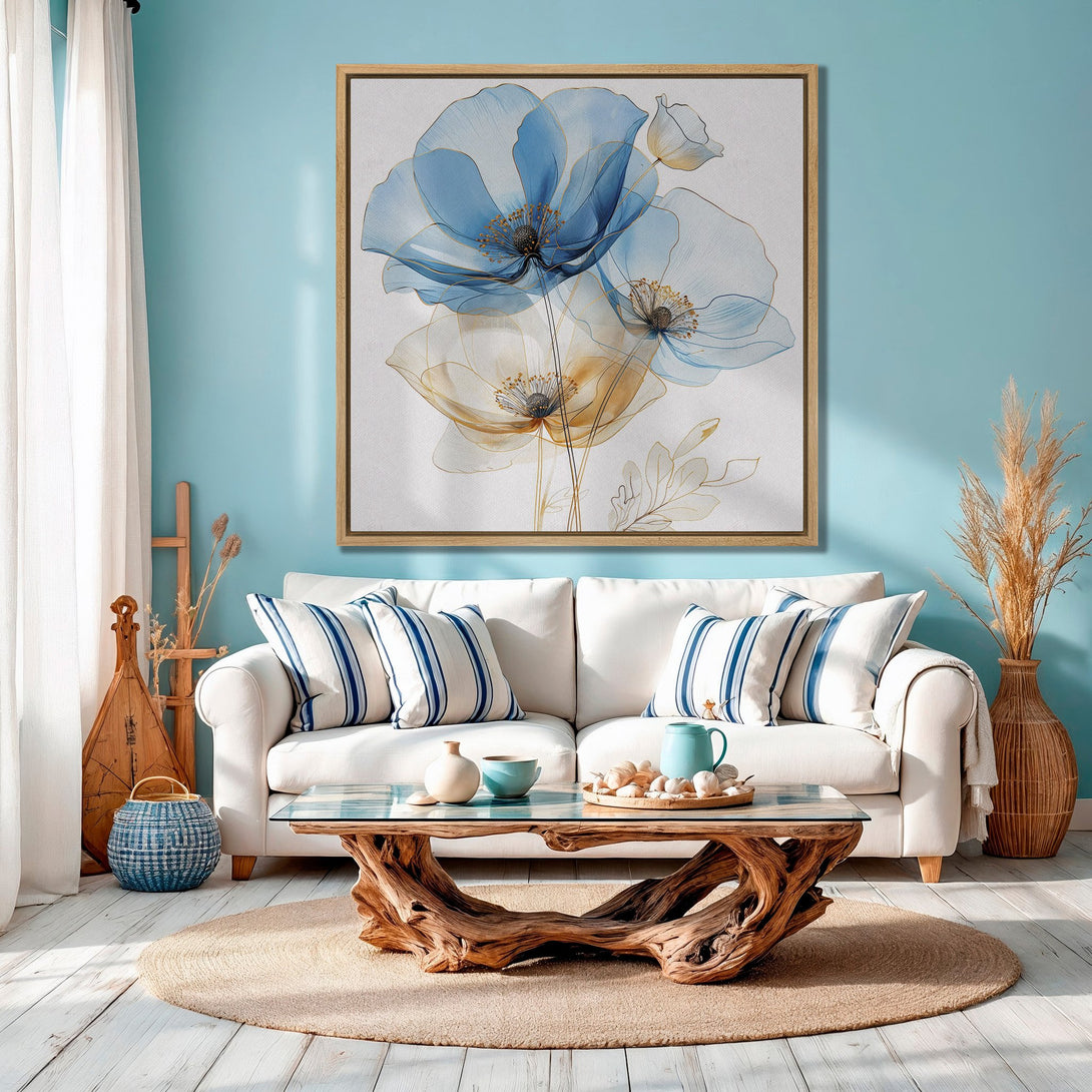 Framed Wall Art featuring elegant blue and gold floral design. Coastal-inspired canvas print adds a touch of serenity to any space. Perfect for living rooms!