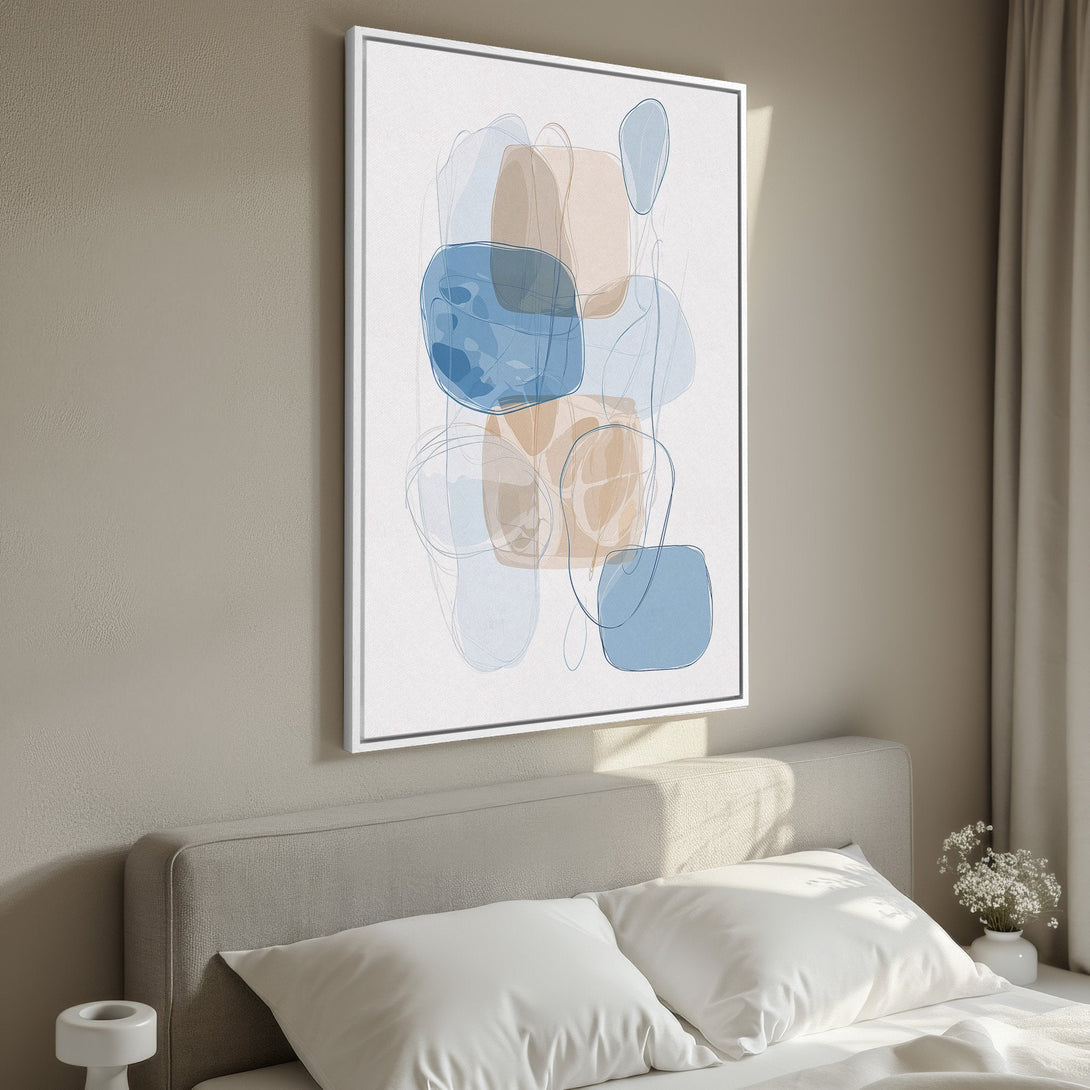 Framed Wall Art featuring abstract shapes in blue and beige tones. Modern art canvas print perfect for bedroom decor.