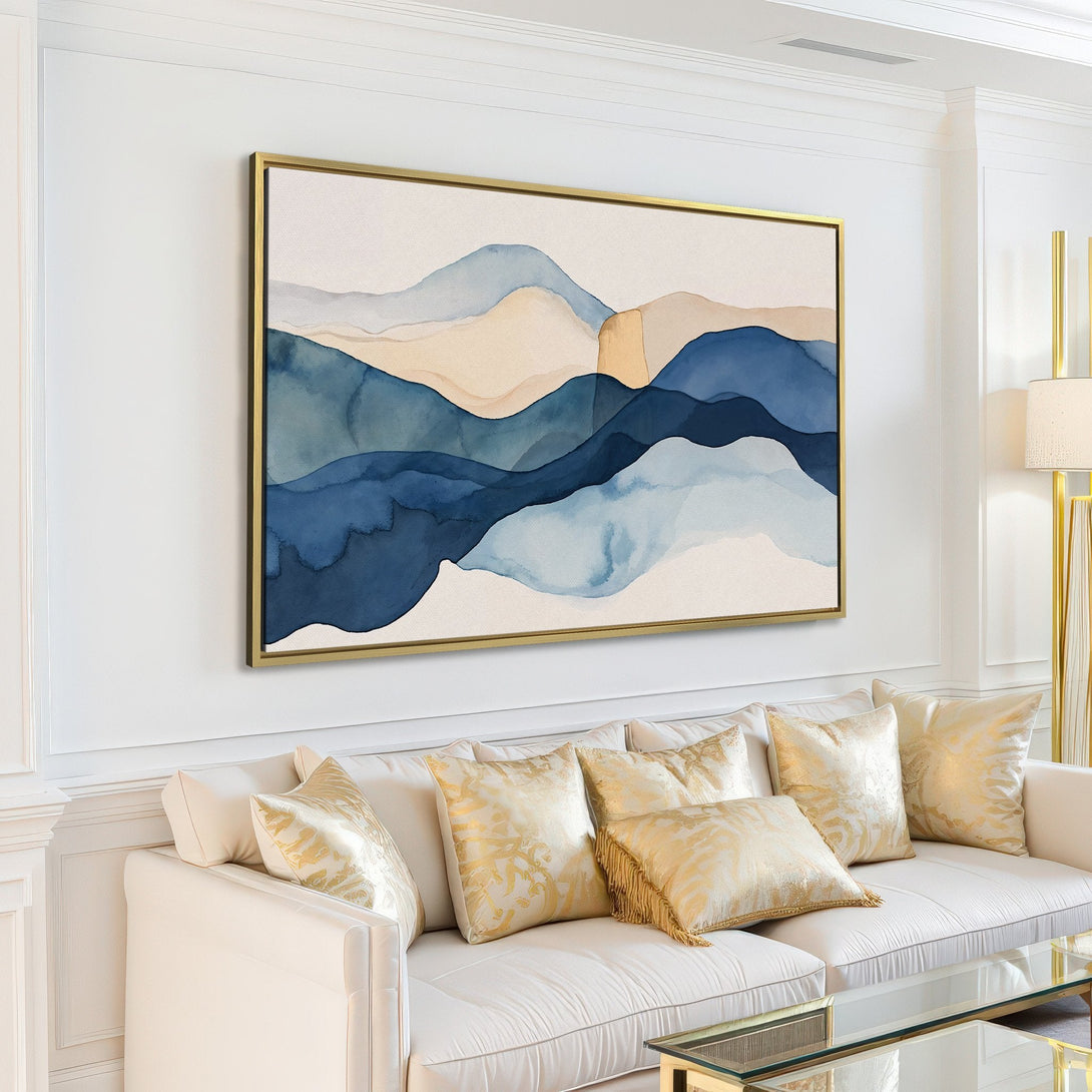 Canvas Print of abstract watercolor landscape in blue and beige tones, displayed in a modern living room.