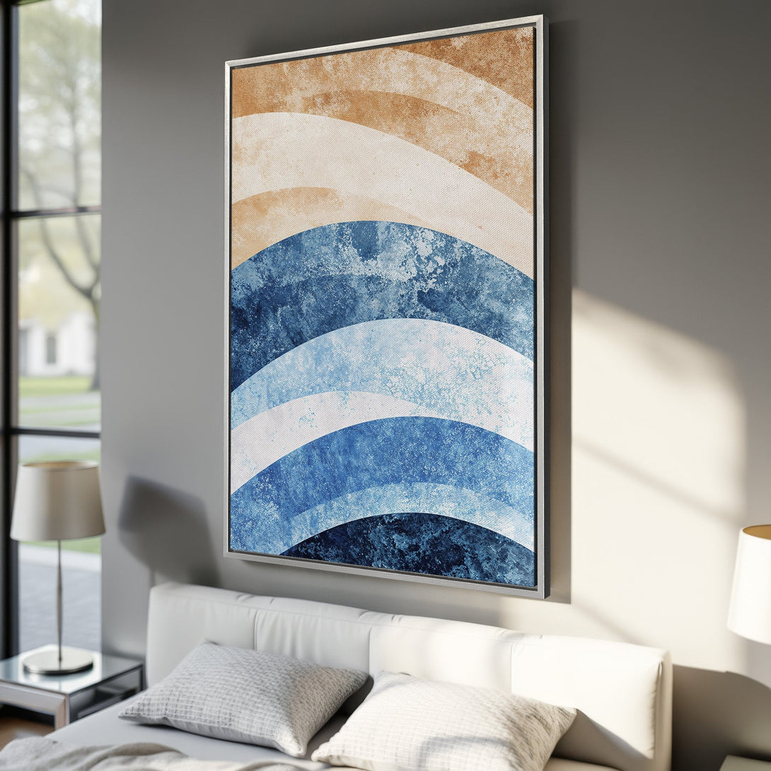 Framed Wall Art featuring abstract blue and beige arches. Modern canvas print adds a touch of serenity and style to any bedroom decor.
