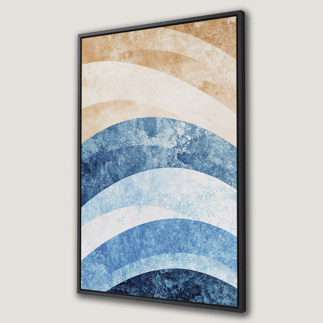 Framed Wall Art featuring abstract blue and tan wave design. Modern canvas print with a calming, neutral color palette. Perfect for adding art to your home!