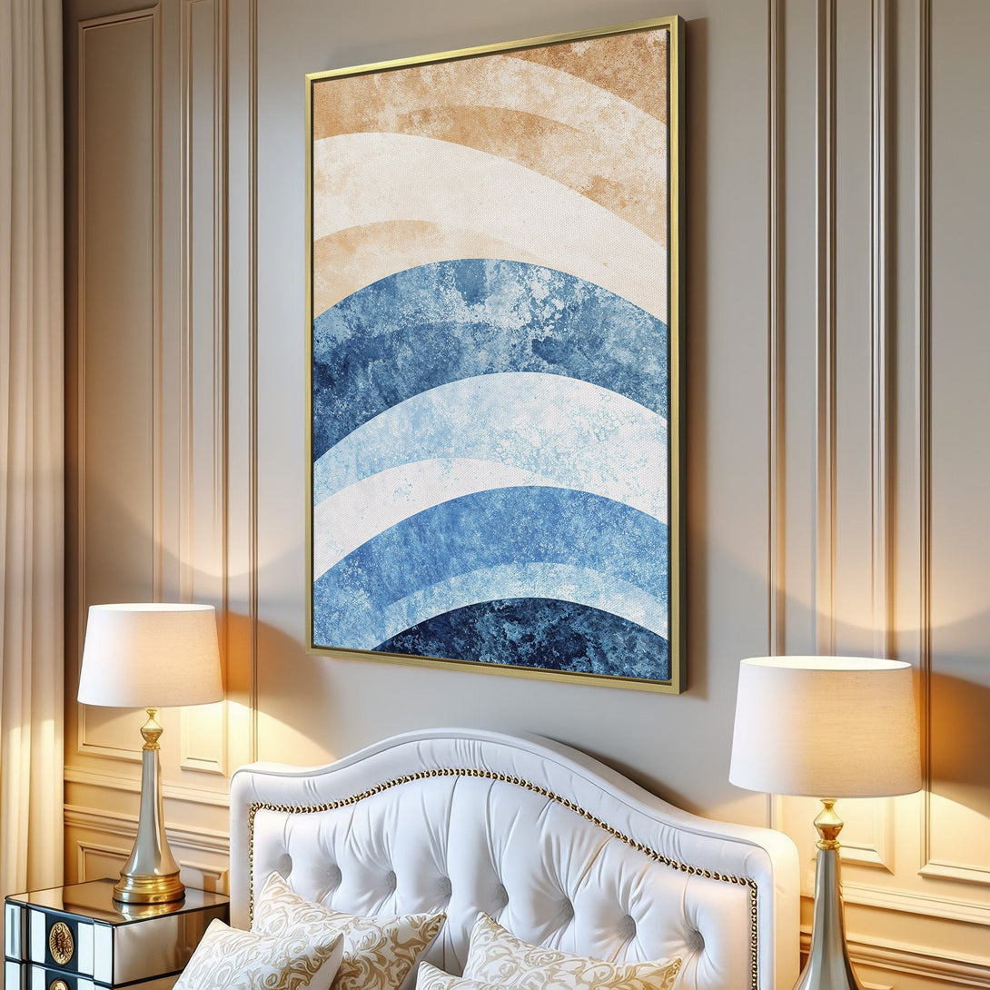 Abstract Canvas Print in a modern interior. Features a blue and beige wave design, perfect for coastal decor.