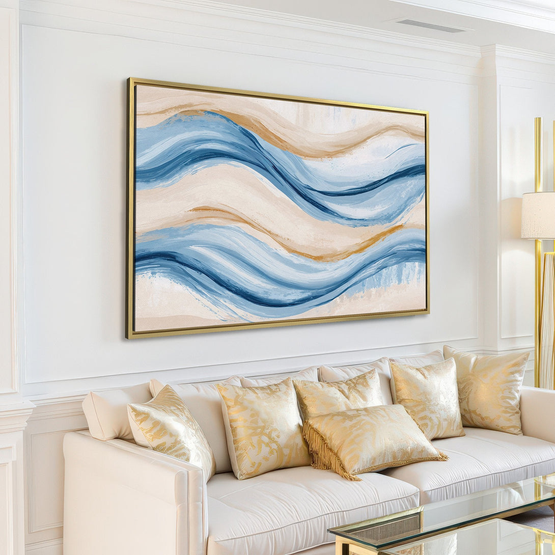 Abstract Canvas Print in a modern living room. Features blue, beige, and gold wave design. Perfect wall art for a calming, stylish interior.