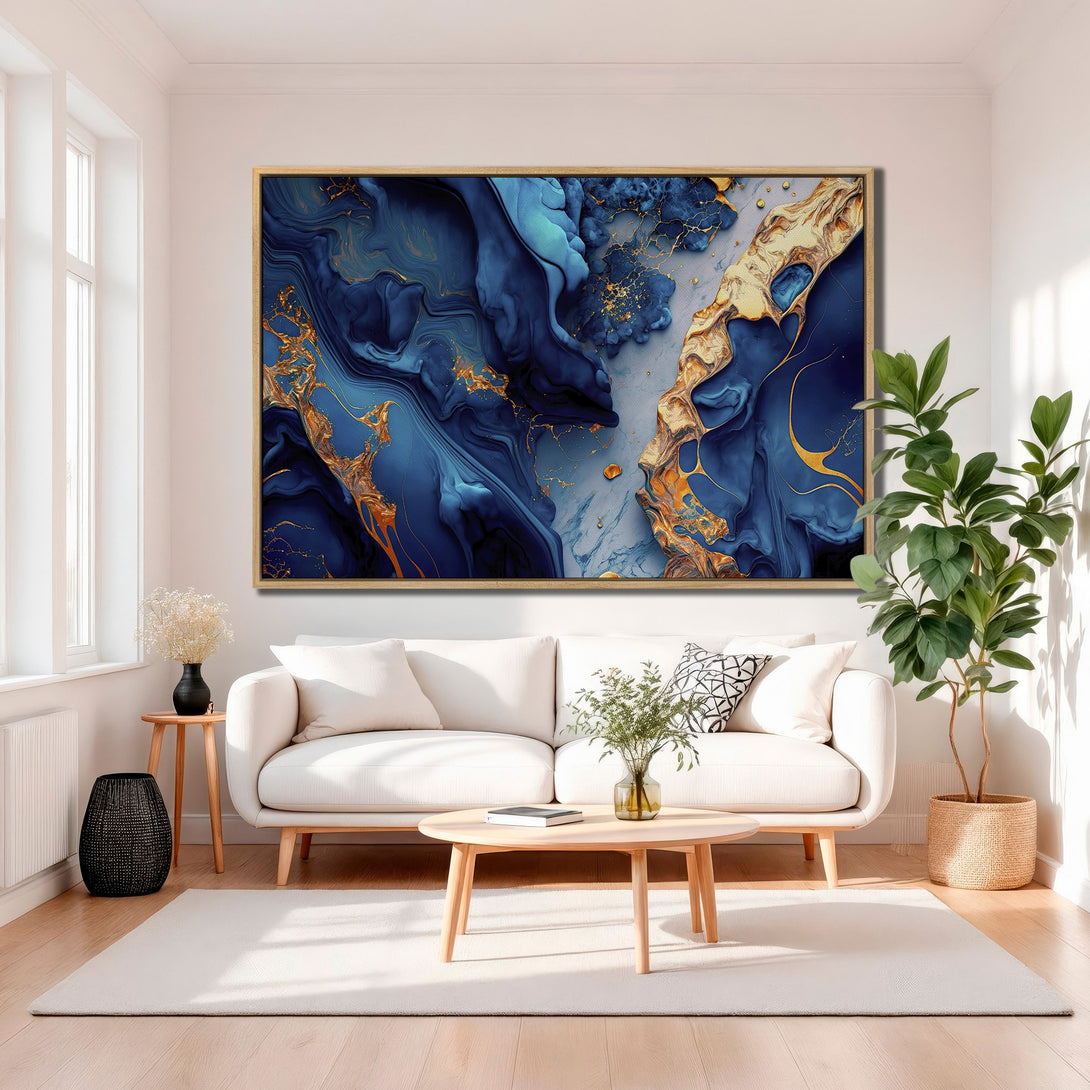 Framed Wall Art featuring abstract blue and gold artwork. Modern decor with a luxurious feel. Enhance your space with this stunning Canvas Print!