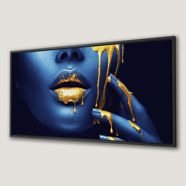 Framed Wall Art: Abstract portrait with blue skin and gold paint. Modern art canvas print with a striking blue and gold color palette.