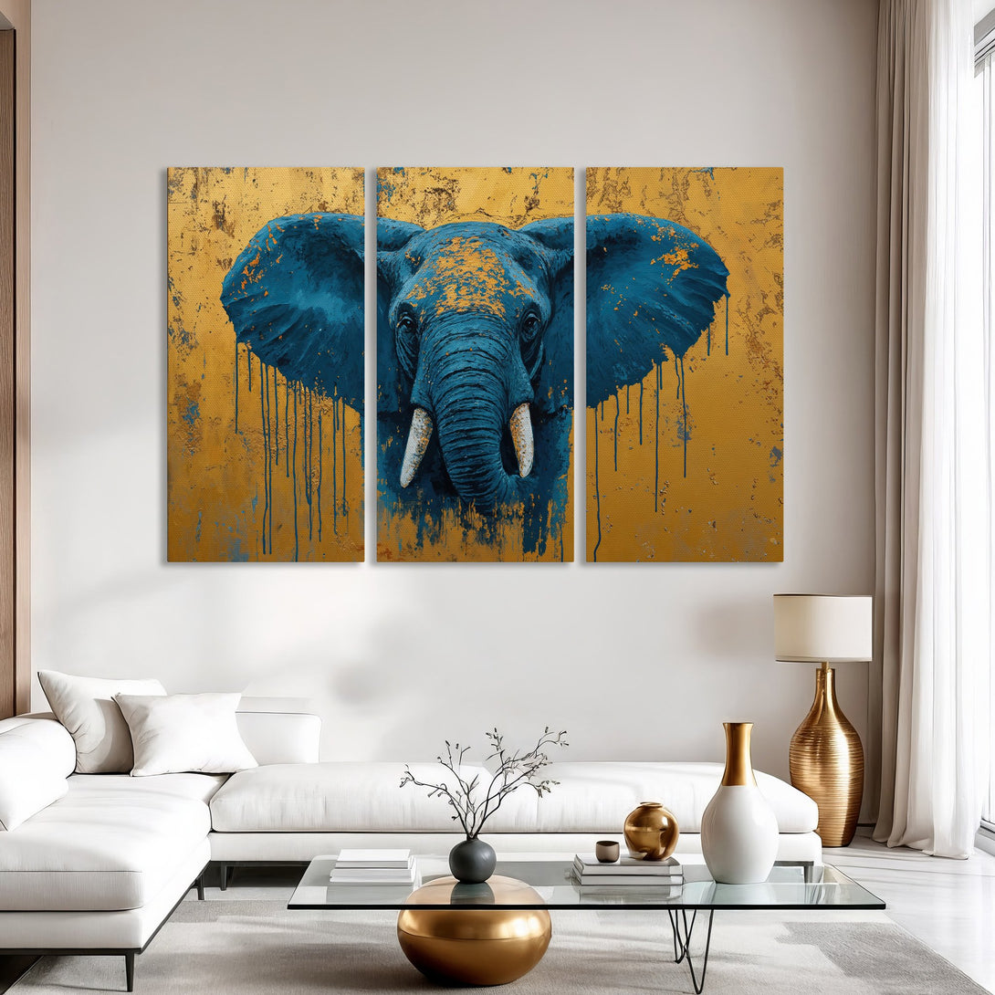 Canvas Print of an elephant head in a modern, abstract style, featuring a gold and teal color palette. Perfect for adding a bold statement to any room.