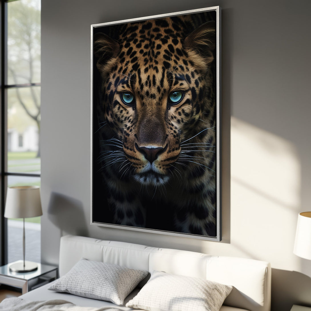 Framed Wall Art: Stunning leopard portrait with piercing blue eyes. Dramatic, modern style. Earthy tones with striking contrast. Perfect for any room.