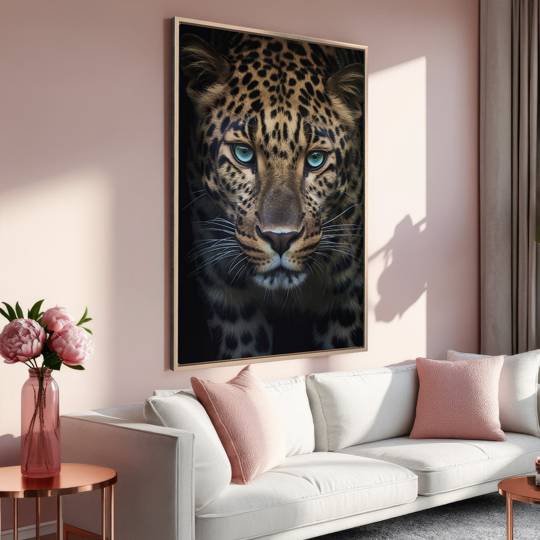 Framed Wall Art: Stunning leopard portrait with captivating blue eyes. Modern decor in a warm, blush pink and neutral color palette. Elevate your space!