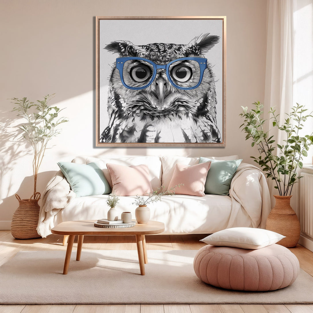 Framed Wall Art featuring a stylish owl with blue glasses. Black and white illustration with a soft, neutral color palette. Perfect for modern home decor.