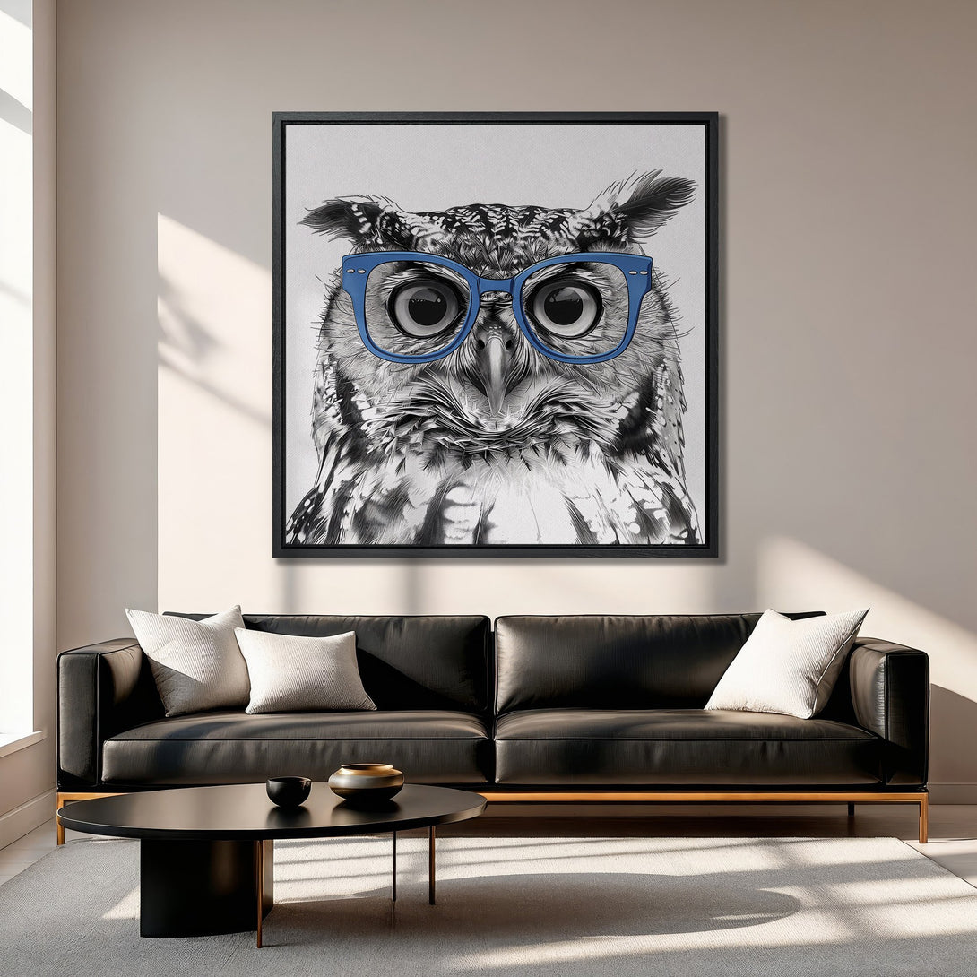 Framed Wall Art: Whimsical owl portrait with blue glasses. Modern black & white art with a pop of color. Perfect for living room decor.