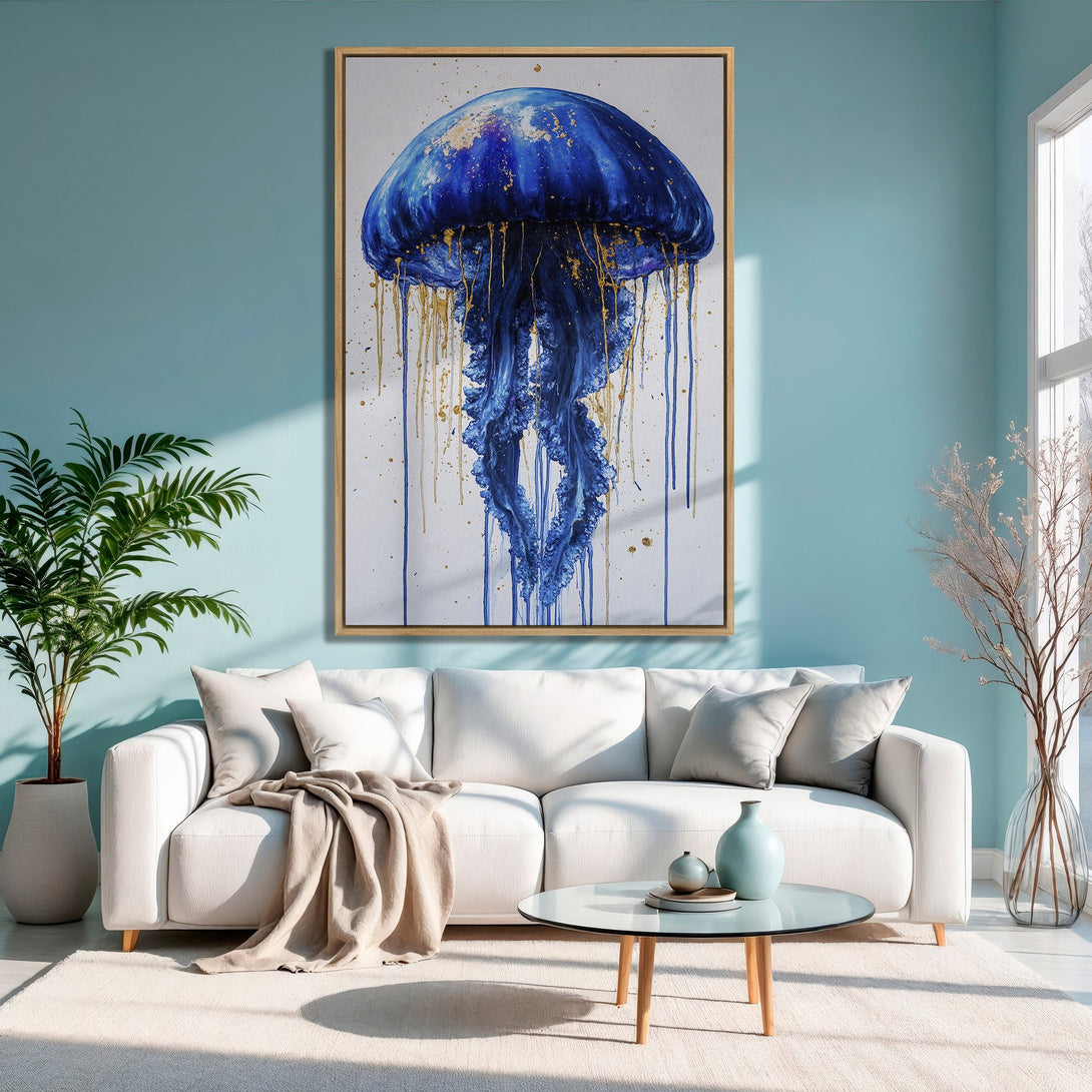 Framed Wall Art: Abstract blue jellyfish painting with gold accents. Modern Canvas Print in a serene interior with a blue and gold color palette.